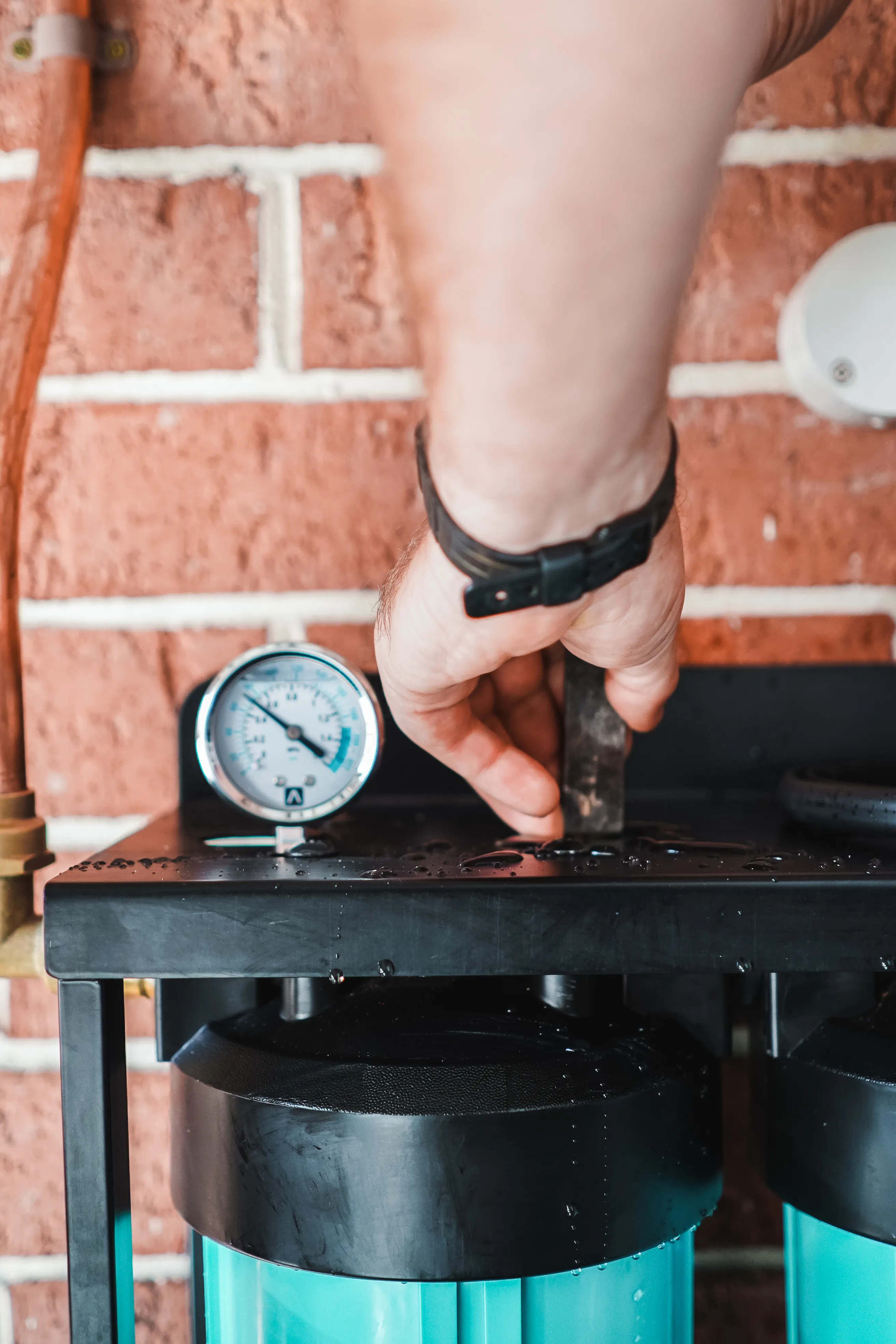 Technician installing a OneWater filtration system